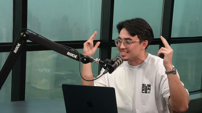 Julian Stafford talking at the microphone in the Surgence Labs Podcast studio