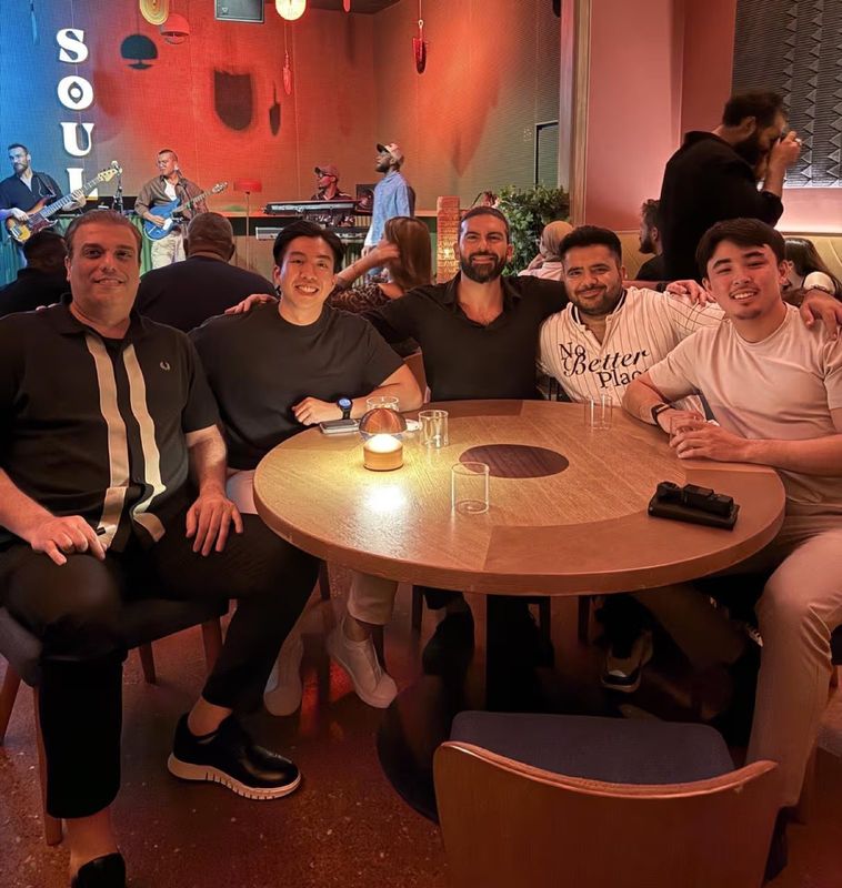 Julian Stafford (right) at dinner with the Surgence Labs team